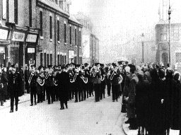 Scene of Shirebrook Market Place Procession Of Funeral of Joseph Levic Head Bandsman